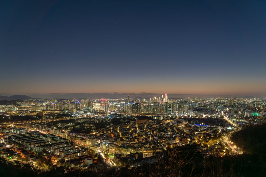 Seoul cityscape night panorama from N Seoul Tower winter observation deck