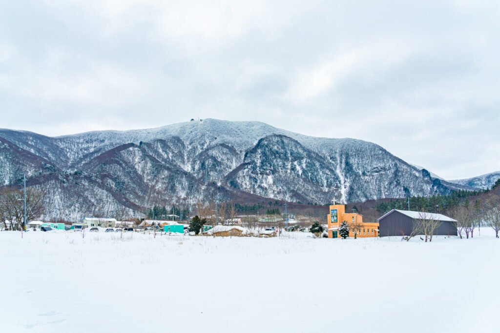 Nari Basin Ulleungdo winter snow landscape with traditional Korean Tumakjip houses