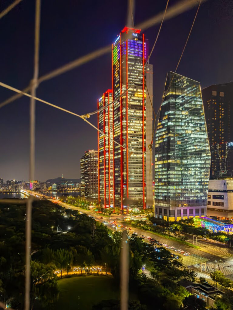 Aerial view from Seoul Dal balloon over Han River and Yeouido towers at night